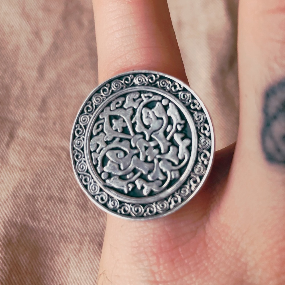 VTG ring with designs.Size 7-ish (adjustable back)